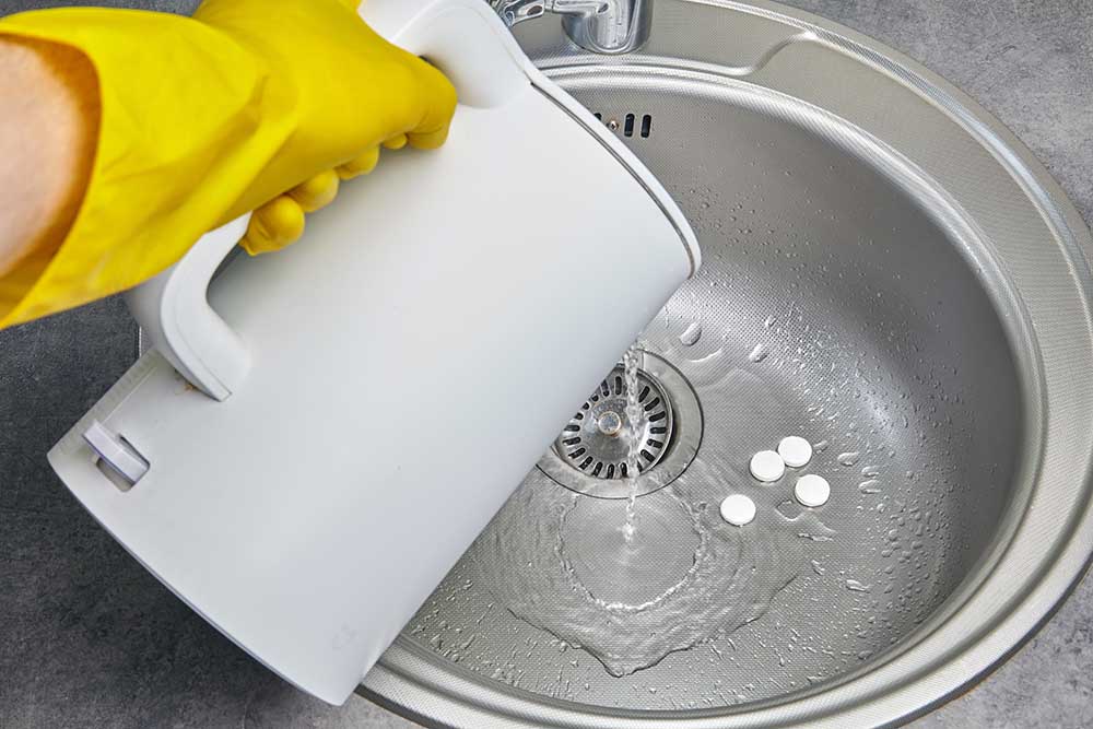 clean, free-flowing kitchen sink drain